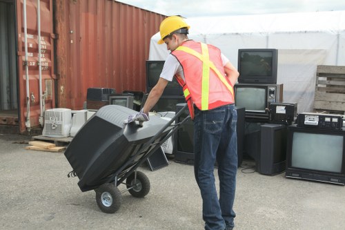 Employees participating in a recycling program